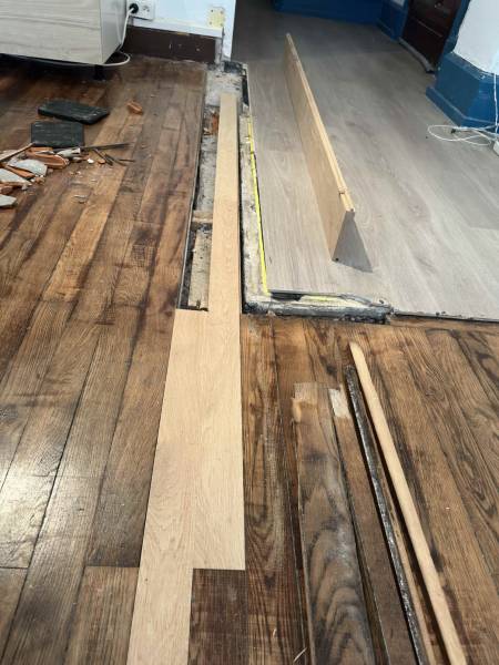 Réparation du parquet en cours